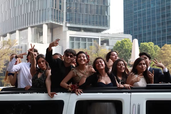 Happy customers enjoying luxury limousine service from www.logisticsmovehub.xyz during a memorable event.