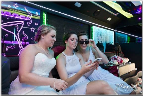 Happy customers enjoying luxury limousine service from www.logisticsmovehub.xyz during a memorable event.